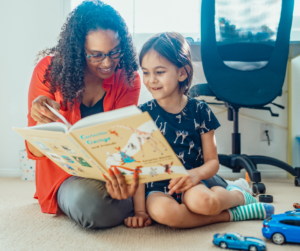 mother and child reading together