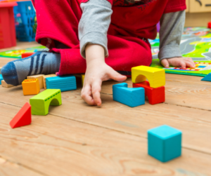 child playing with blocks