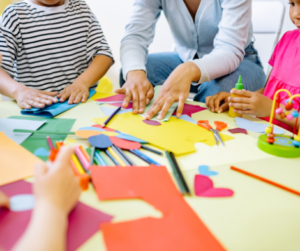 kindergarten class making crafts