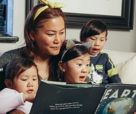 mom reading to all her kids
